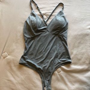 Baby Blue Suede Body Suit.